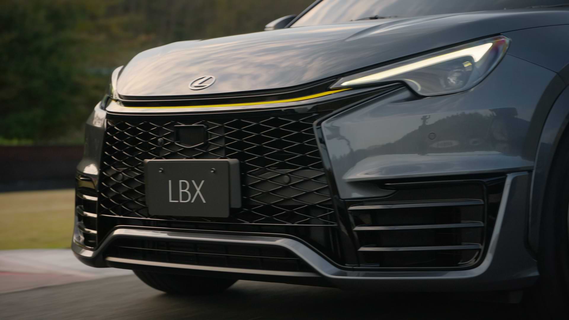 Bottom front view of a moving car.